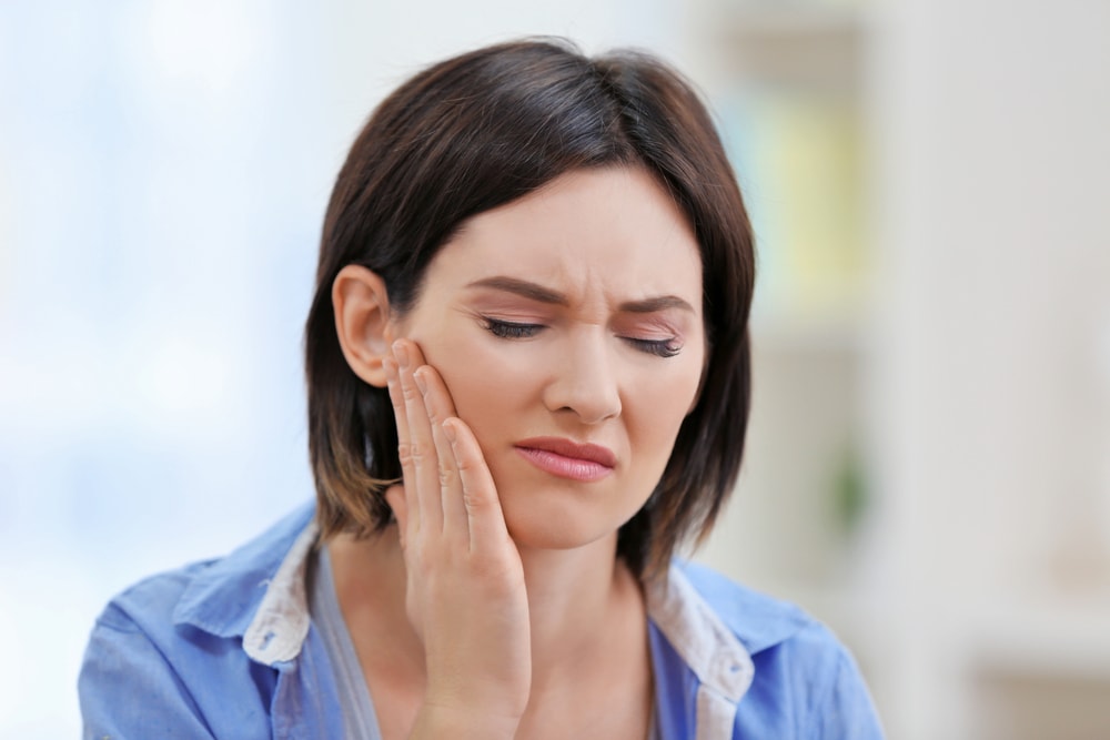 Pain After Tooth Extraction: What's Normal and How Long Does It Last?